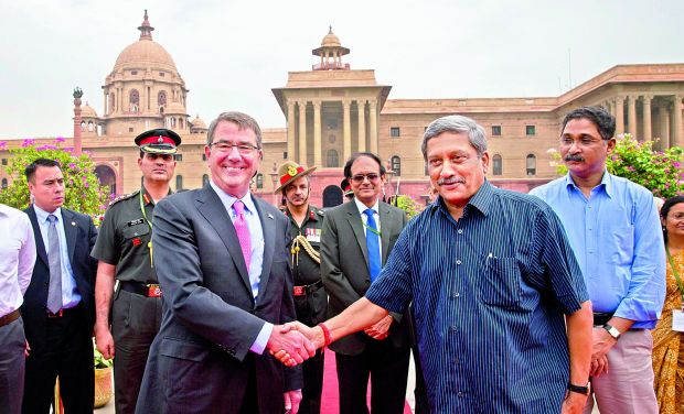 US defence secretary Ashton Carter, left, shakes hands with defence minister Manohar Parikkar in New Delhi on Wednesday. Mr Carter is in India on a three-day visit. (Photo: AP) US defence secretary Ashton Carter, left, shakes hands with defence minister Manohar Parikkar in New Delhi on Wednesday. Mr Carter is in India on a three-day visit. (Photo: AP)